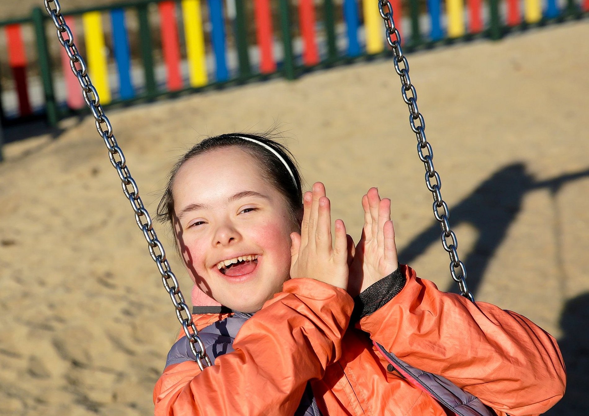 Portrait of beautiful girl on the playground playground,syndrome,latin,preschooler,preschool,special,march,day,down,happiness,people,disability,portrait,handicap,smile,disabled,needs,lifestyle,world,girl,young,childhood,school,handicapped,kid,child,health,childcare,little,asian,mental,downs syndrome,care,education,joy,awareness,cute,month,teen,special needs,face,female,fun,play,positive,relationship,season,happy,asia,beautiful